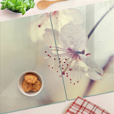 Schneidebrett Blumen auf geometrischem Hintergrund