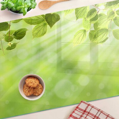 Schneidebrett Glas mit grünem Blattmotiv im Lichtdesign