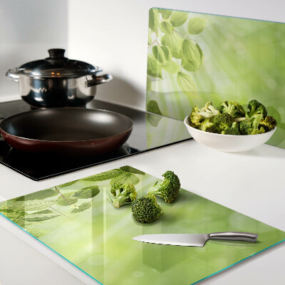 Schneidebrett Glas mit grünem Blattmotiv im Lichtdesign