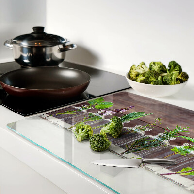 Glas-Schneidebrett mit dekorativem Motiv „Pflanzen in Flaschen”