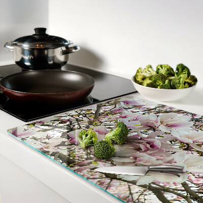 Schneidebrett mit Motiv aus Magnolienblüten