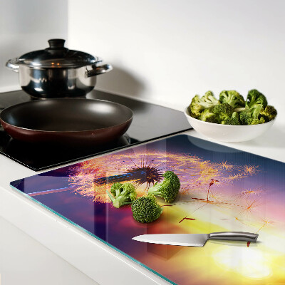 Schneidebrett Glas mit Motiv Löwenzahn vor einem Sonnenuntergang