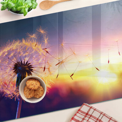 Schneidebrett Glas mit Motiv Löwenzahn vor einem Sonnenuntergang