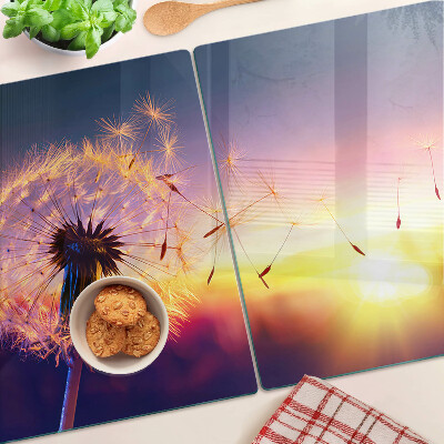 Schneidebrett Glas mit Motiv Löwenzahn vor einem Sonnenuntergang