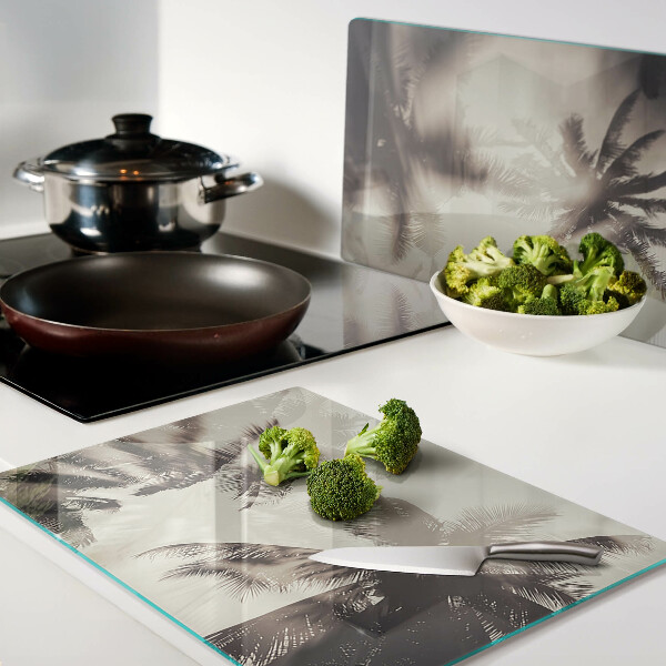 Schneidebrett Palmen auf einfarbigem Hintergrund