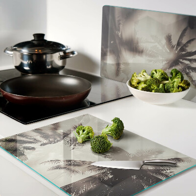 Schneidebrett Palmen auf einfarbigem Hintergrund