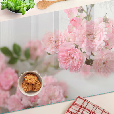 Glas schneidebrett Rosa Blumen in einer Vase