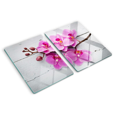 Schneidebrett glas Orchideen auf weißem Hintergrund