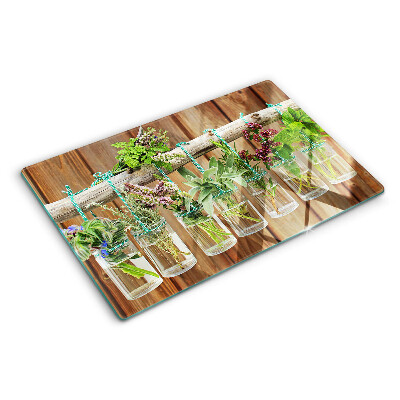 Schneidebrett Glas mit Motiv Kräuter in Gläsern auf Holzgrund