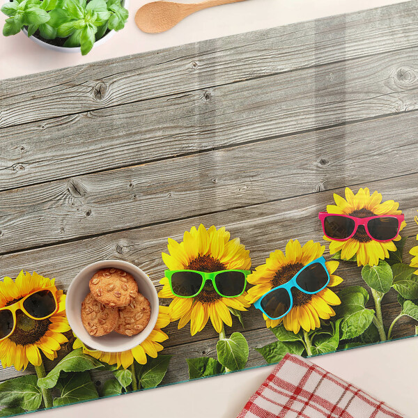 Glas-Schneidebrett mit Sonnenblumenmotiv und Sonnenbrillen-Design