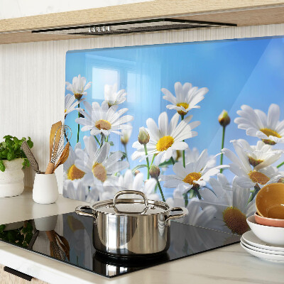 Schneidebrett Glas mit Gänseblümchen-Motiv auf blauem Hintergrund