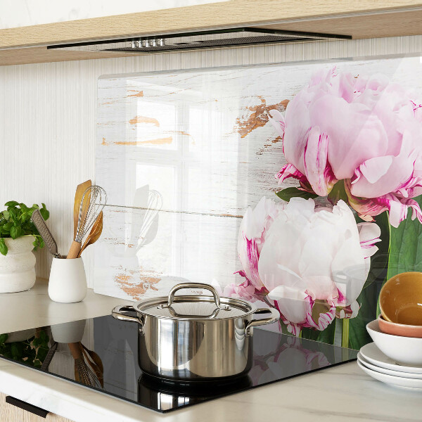 Glas-Schneidebrett mit Pfingstrosen auf Holzoptik