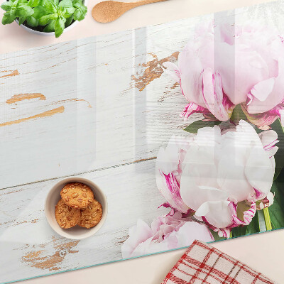 Glas-Schneidebrett mit Pfingstrosen auf Holzoptik