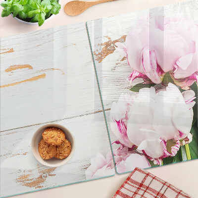 Glas-Schneidebrett mit Pfingstrosen auf Holzoptik