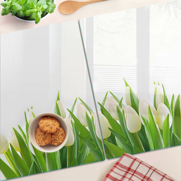 Schneidebrett mit Tulpenmotiv auf grünem Gras