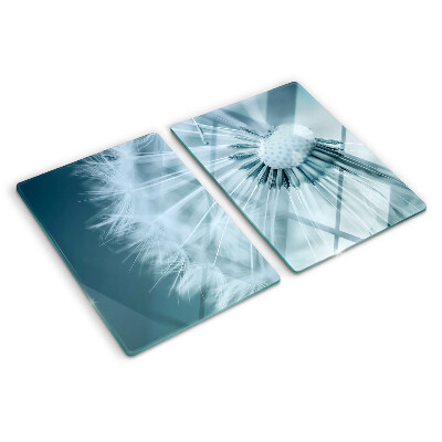 Glas schneidebrett Löwenzahn vor dem Himmel