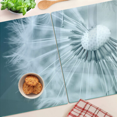 Glas-Schneidebrett mit Motiv Löwenzahn vor dem Himmel