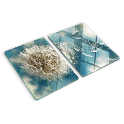 Glas-Schneidebrett mit Motiv eines Löwenzahns vor dem Himmel