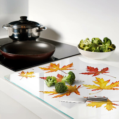 Schneidebrett Glas mit Ahornblättern in Herbstfarben