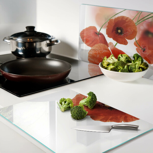 Glas-Schneidebrett mit Mohnblumen in roter Farbe