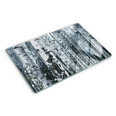 Glas-Schneidebrett mit dem Motiv „Birkenwald in Winterlandschaft“