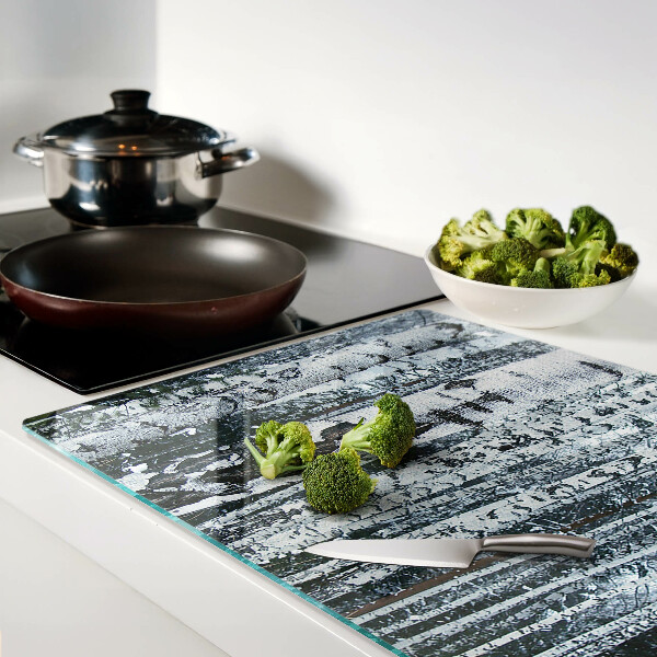 Glas-Schneidebrett mit dem Motiv „Birkenwald in Winterlandschaft“