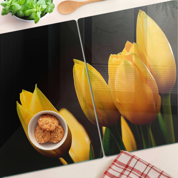 Schneidebrett Gelbe Tulpen auf schwarzem Hintergrund