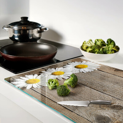 Schneidebrett mit Blumenmotiv auf Holzgrund