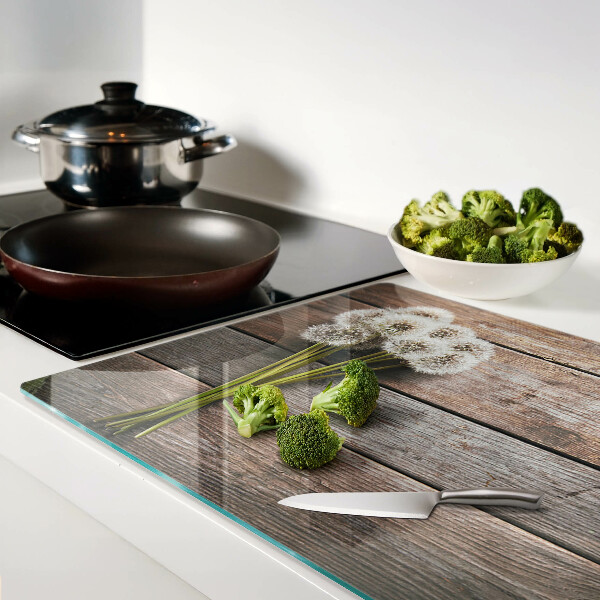 Schneidebrett Glas mit Motiv aus Löwenzahnblüten auf Holzoptik