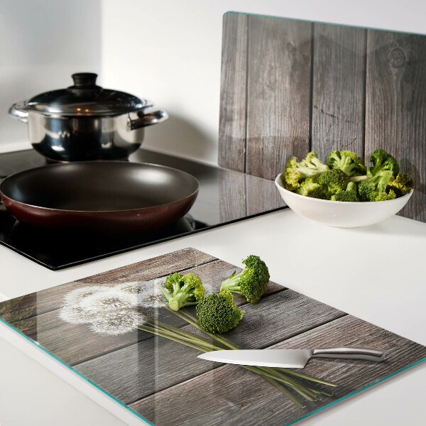 Schneidebrett Glas mit Motiv aus Löwenzahnblüten auf Holzoptik