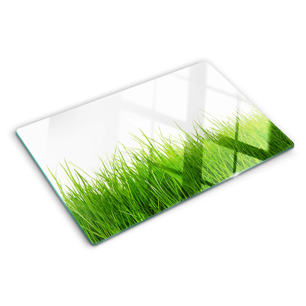 Glas schneidebrett Gras in der Sonne
