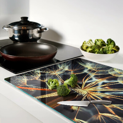 Glas-Schneidebrett mit Motiv einer Löwenzahn-Makrofotografie