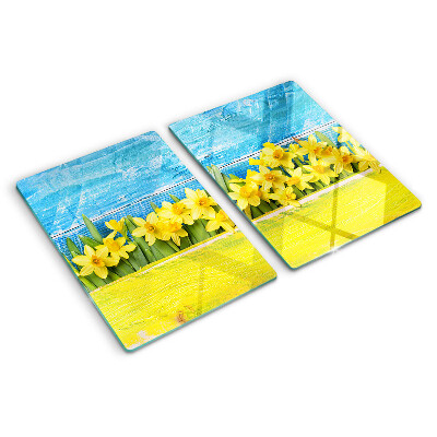 Schneidebrett Narzissenblüten vor dem Himmel