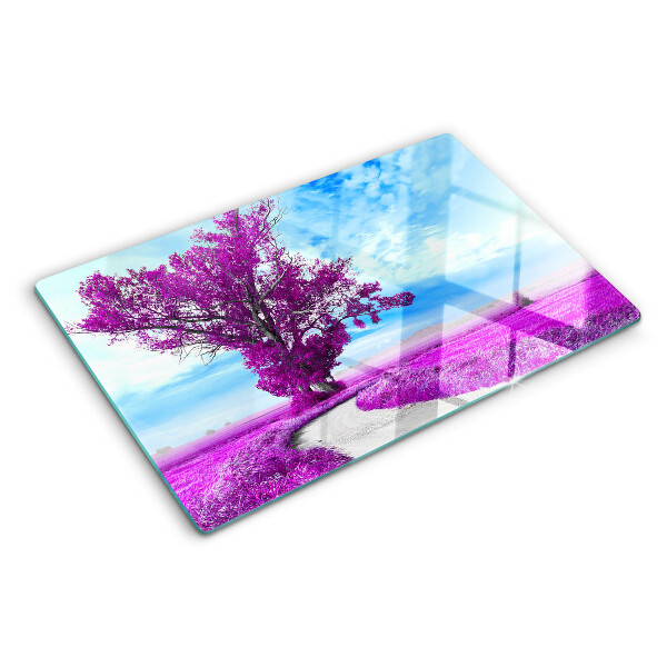 Schneidebrett Ein violetter Baum vor dem Himmel