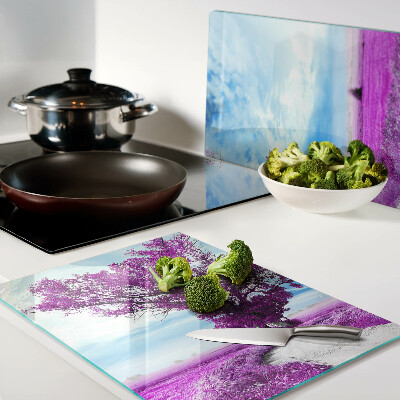 Schneidebrett Ein violetter Baum vor dem Himmel