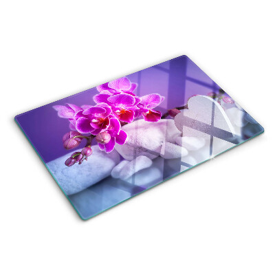 Schneidebrett Glas mit Orchideenmotiv auf Steinen