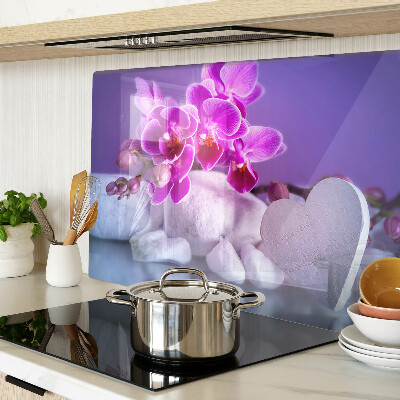 Schneidebrett Glas mit Orchideenmotiv auf Steinen