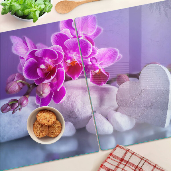 Schneidebrett Glas mit Orchideenmotiv auf Steinen