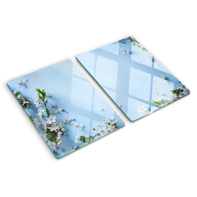 Glas schneidebrett Blumenmuster auf blauem Hintergrund
