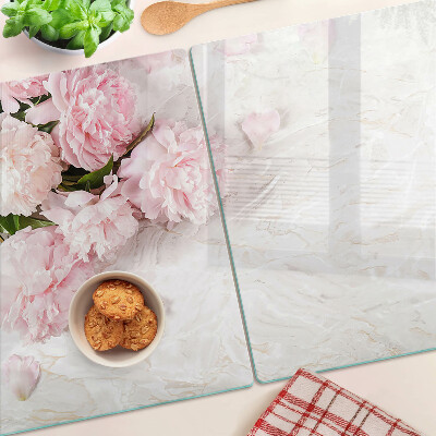 Glas schneidebrett Pfingstrosen auf Marmorgrund