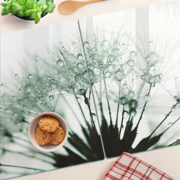 Schneidebrett mit Löwenzahn-Motiv und Wassertropfen