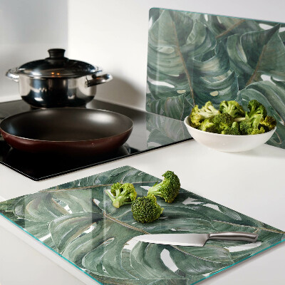 Schneidebrett Glas mit Monstera-Blättern bedruckt