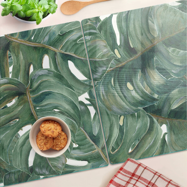Schneidebrett Glas mit Monstera-Blättern bedruckt