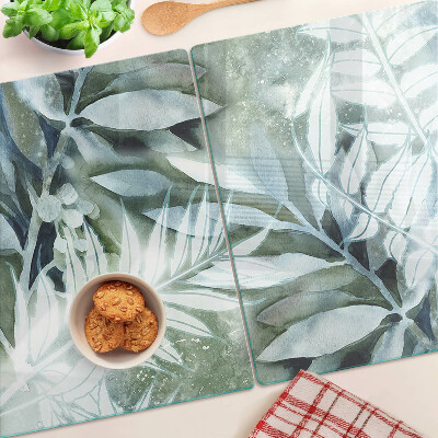 Glas-Schneidebrett mit Motiv tropischer Blätter in Pastelltönen