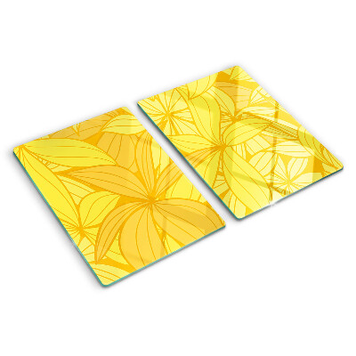 Glas-Schneidebrett mit gelbem tropischem Blattmotiv