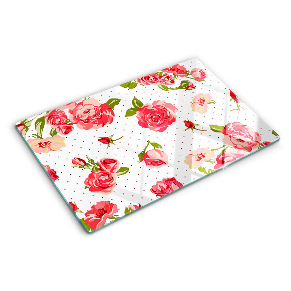 Glas-Schneidebrett mit Rosendekor auf weißem Hintergrund