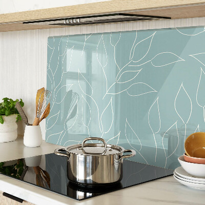 Schneidebrett glas Blätter im Hintergrund