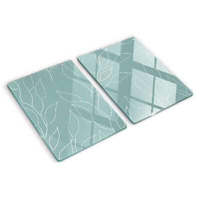 Schneidebrett glas Blätter im Hintergrund