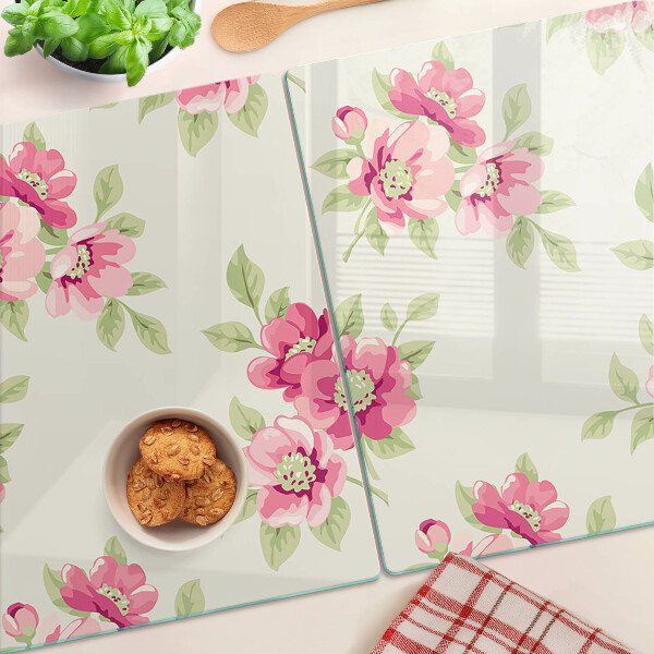 Glas-Schneidebrett mit Blumenmuster in Rosatönen