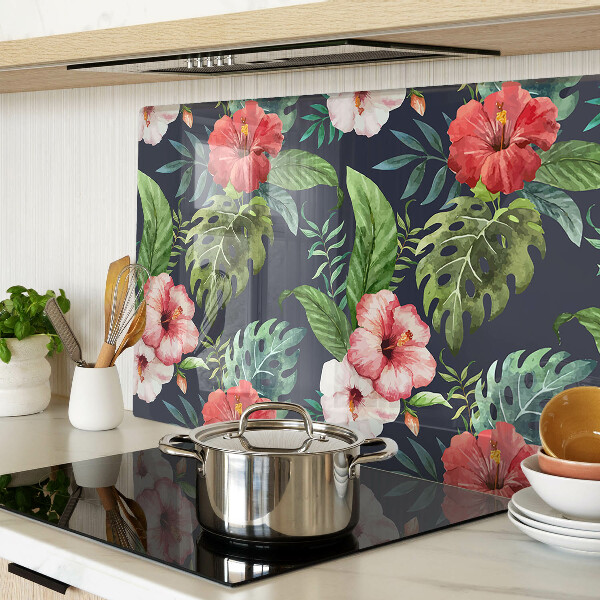 Glas-Schneidebrett mit tropischen Blumen und Blättern